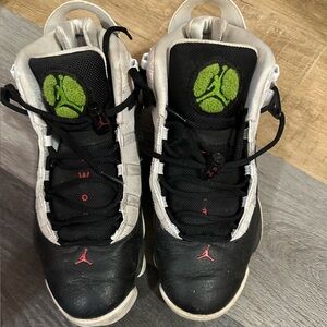 Nike Air Jordan Black Shoes with Green and Red Accents